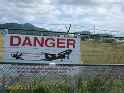 Danger sign at Maho Beach, St. Maarten