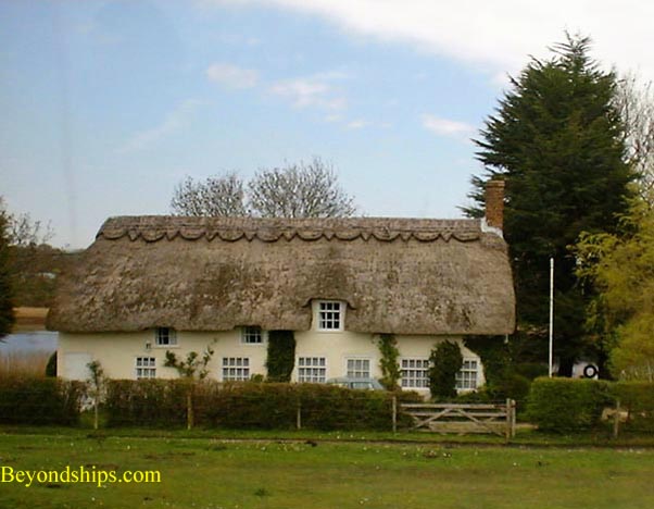 Picture  New Forest, England thatched roof house
