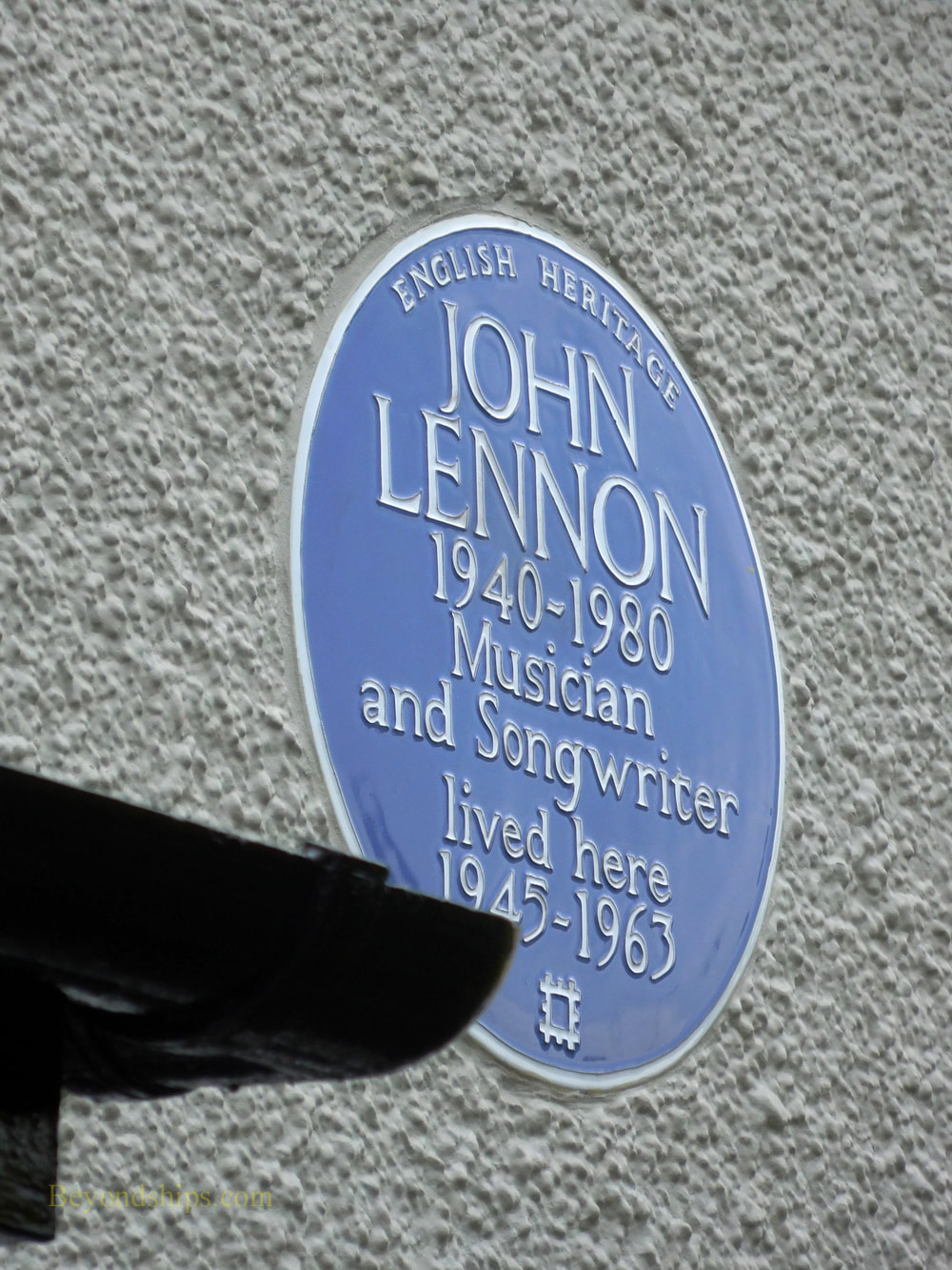 Blue plaque showing that Jon Lennon lived at Menips, Liverpool England